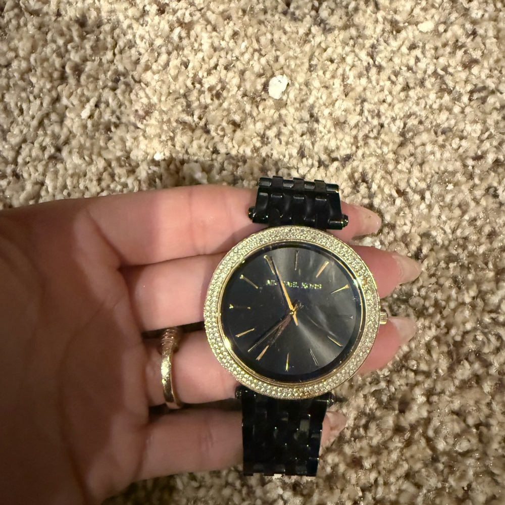 Michael Kors Black and Gold Timepiece